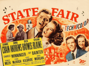Movie poster for State Fair (Technicolor) featuring a smiling couple at center, a bright red title, and a yellow cast list with actors' names including Jeanne Crain and Dana Andrews; 20th Century Fox logo.