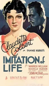 Vintage movie poster for Imitation of Life featuring Claudette Colbert in the foreground with a man in the background; title and credits visible in bold typography.
